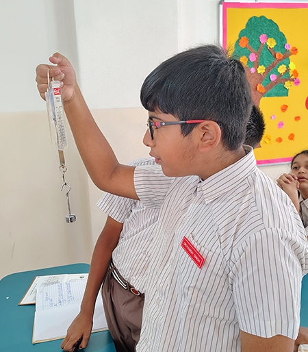 Science Lab Spring Balance Experiment