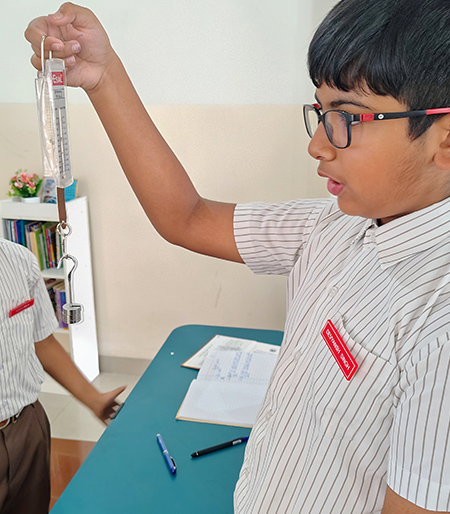 Science Lab Spring Balance Experiment